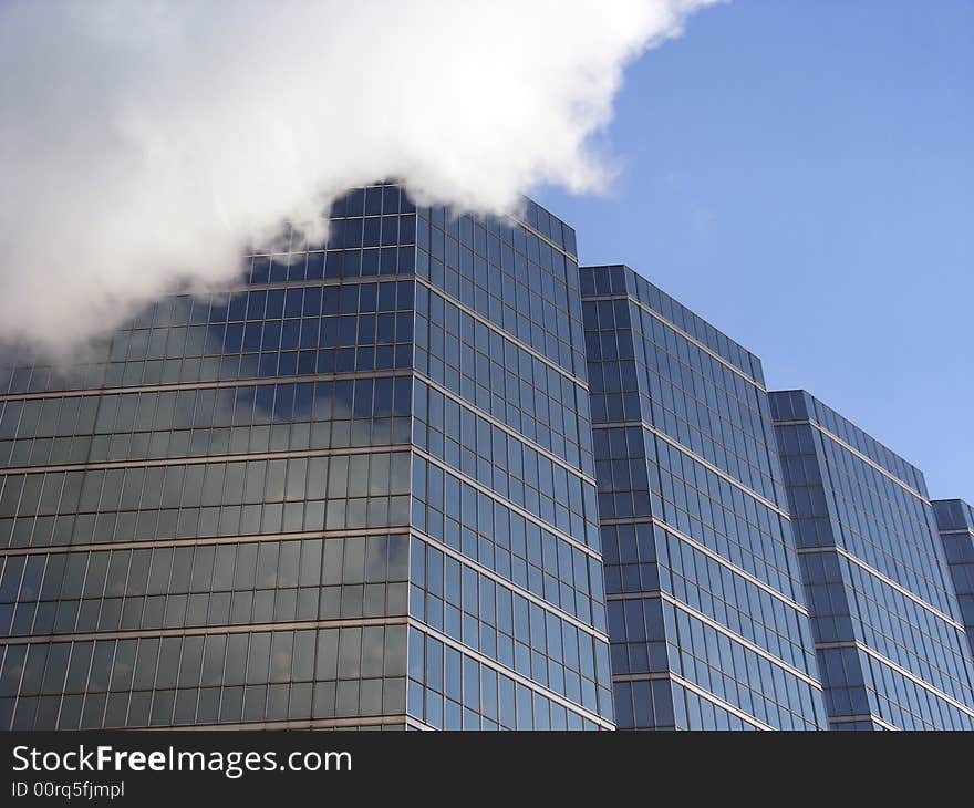 Really a skyscraper, with clouds and everything. Actually just steam from a heating plant.