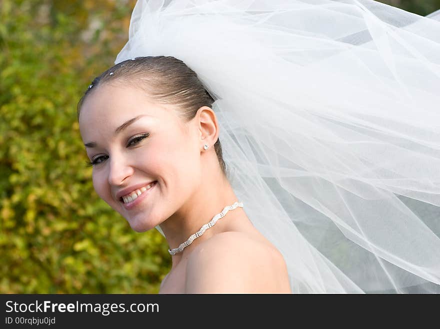 Bride with a flying downwind veil