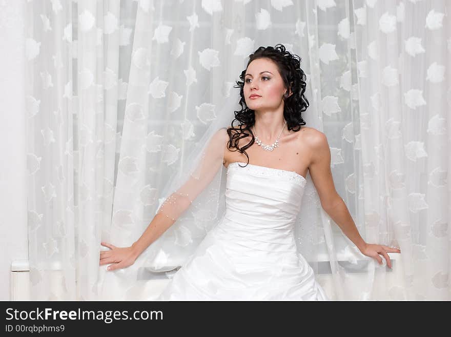 A Beautiful Bride By The Window