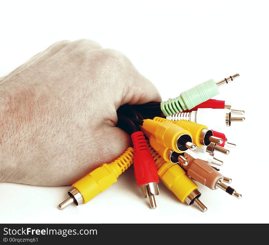 Varicoloured Cable In A Hand On A White Background