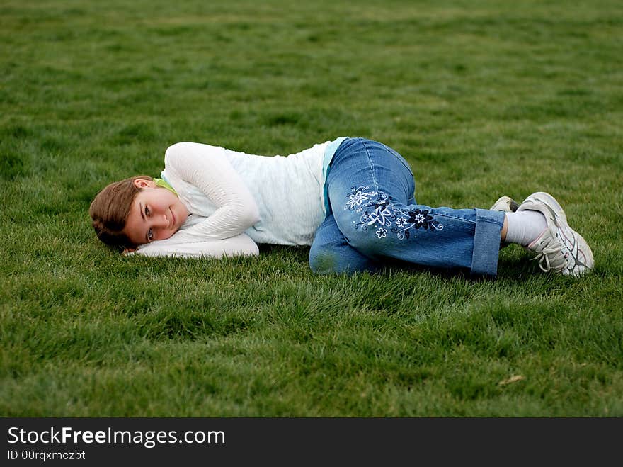 Young and happy girl is enjoying herself outdoors. Young and happy girl is enjoying herself outdoors