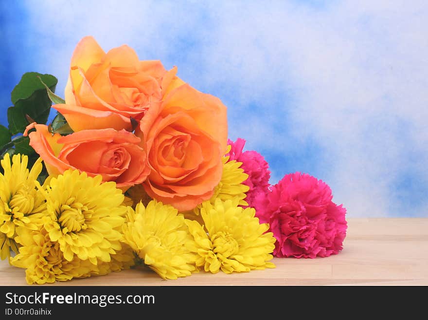 Flower Bouquet on Table With Blue Textured Background. Flower Bouquet on Table With Blue Textured Background