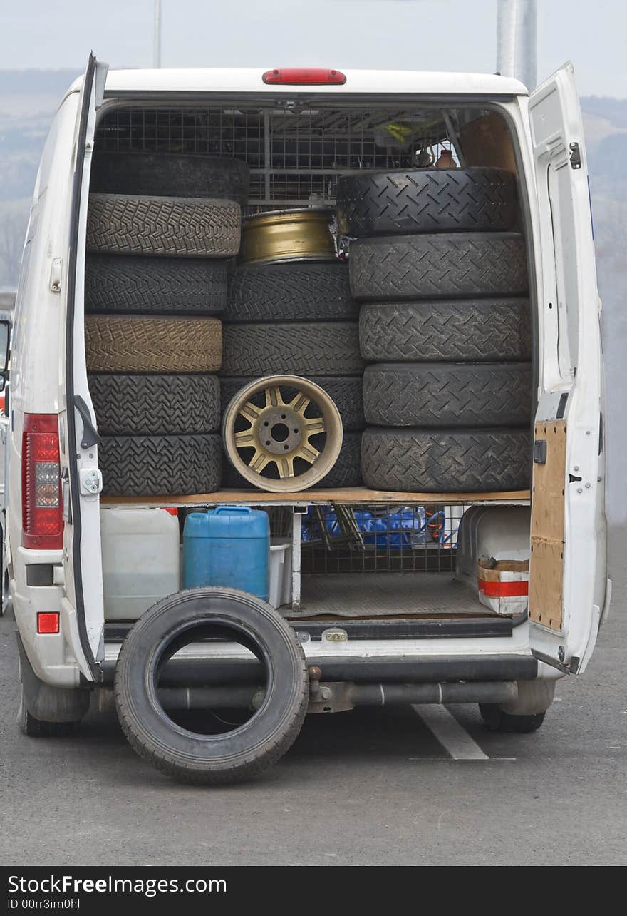 Image of a service truck carrying wheels for rally cars.Shot with Canon 70-200mm f/2.8L IS USM. Image of a service truck carrying wheels for rally cars.Shot with Canon 70-200mm f/2.8L IS USM