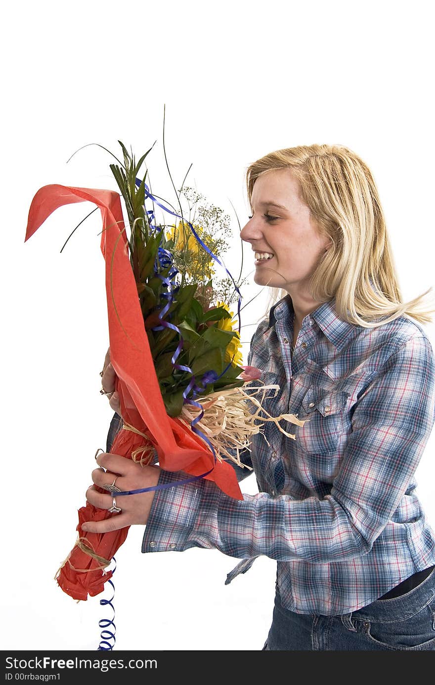 Young girl holding her flowers. Young girl holding her flowers