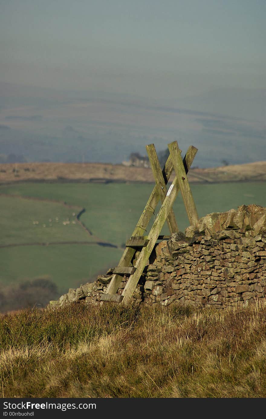 A picturesque view of a stile in yorkshire