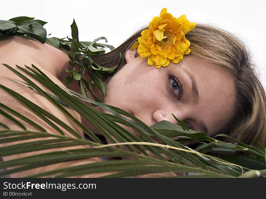 Girl relaxing covered with leaves. Girl relaxing covered with leaves