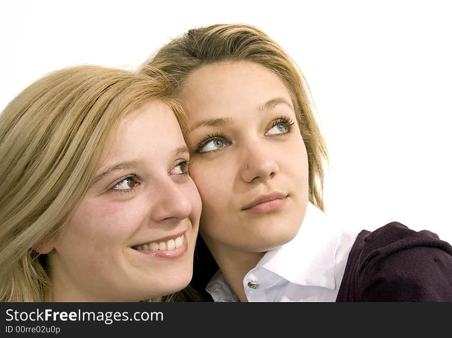 Girls posing together in studio. Girls posing together in studio