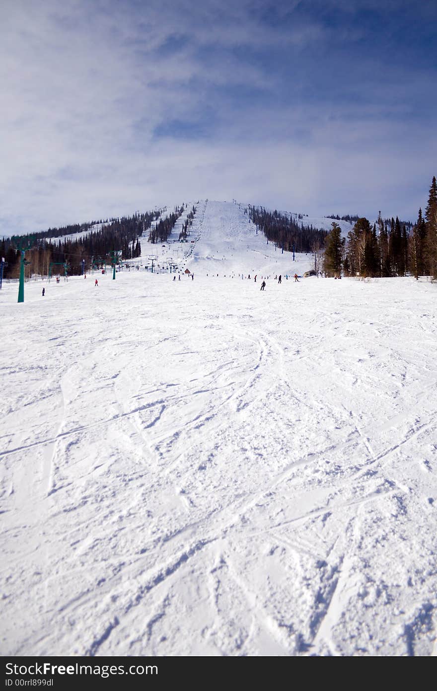 Long slope for skiing and snowboarding with elevator