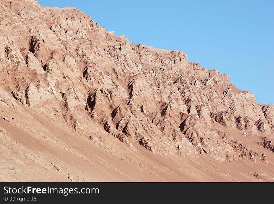 The Flaming Mountain is located on the northern verge of Turpan Basin, more than 10 kilometers away from Turpan city. It is the cradle of the Turpan ancient civilization and oasis agriculture. Xinjiang, China October, 2007. The Flaming Mountain is located on the northern verge of Turpan Basin, more than 10 kilometers away from Turpan city. It is the cradle of the Turpan ancient civilization and oasis agriculture. Xinjiang, China October, 2007