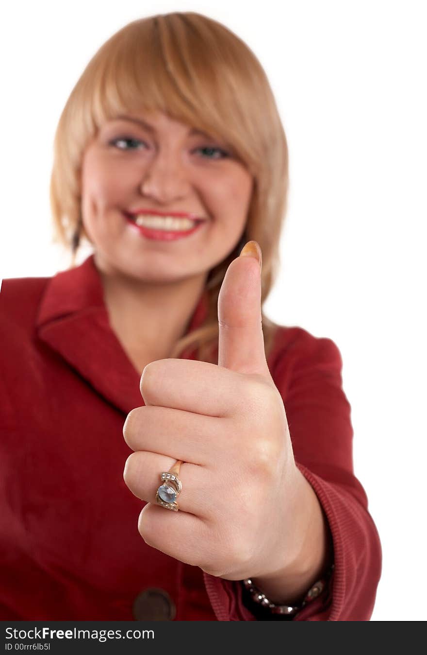 An image of girl in red suit. Showing his thumb. An image of girl in red suit. Showing his thumb.