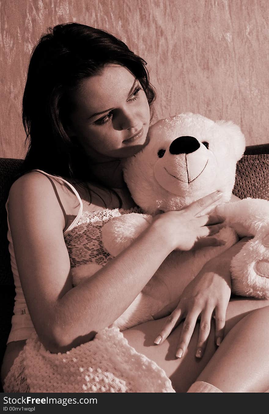 Girl With A Toy Bear