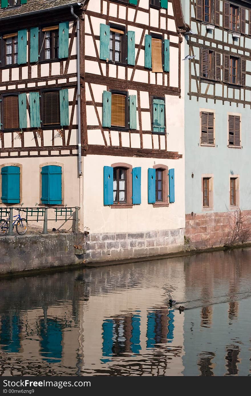 Half Timbered House in Strasbourg, with reflection in canal. Half Timbered House in Strasbourg, with reflection in canal