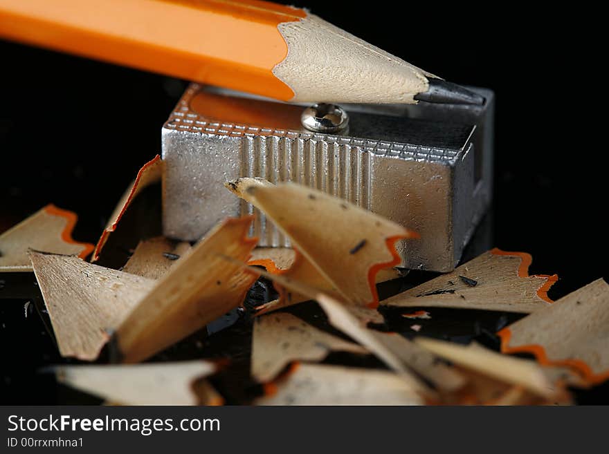 Close up of sharpener and pencil