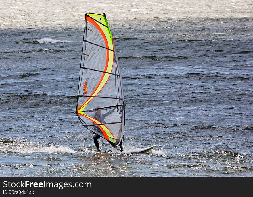 Surfer on the lake during windy weather