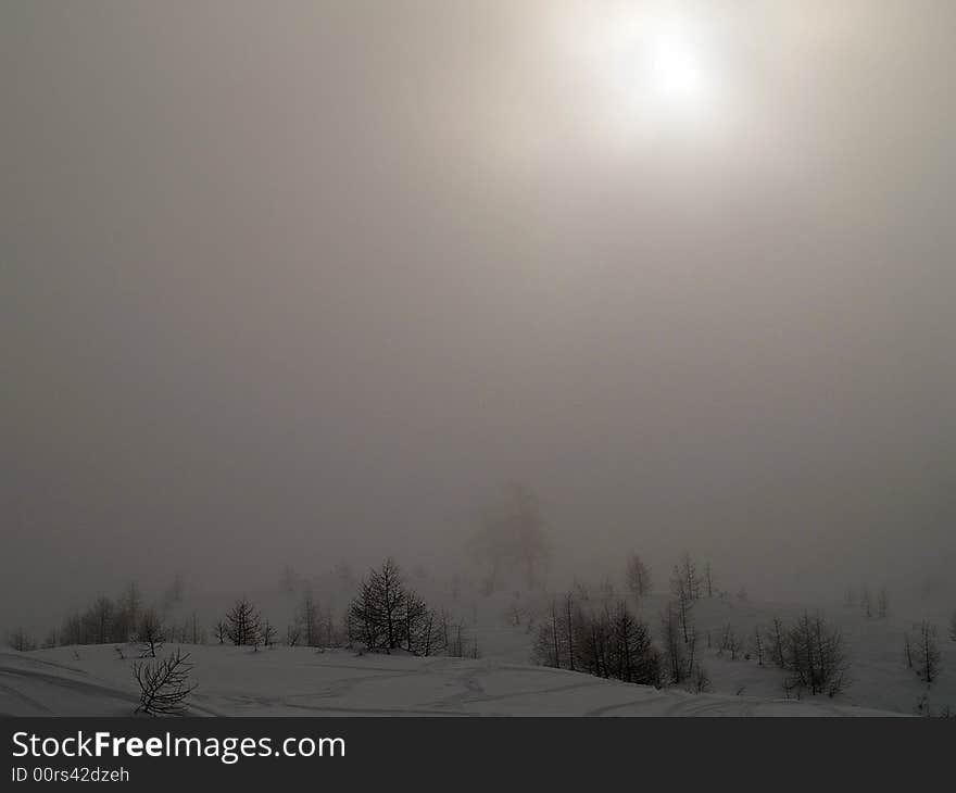 Fog and snow in the high mountains