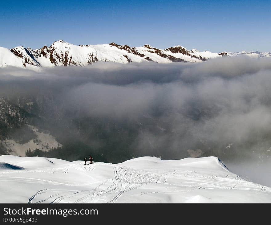 On the top of a mountain above the clouds