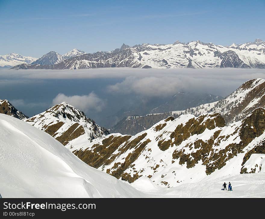 On the top of a mountain above the clouds