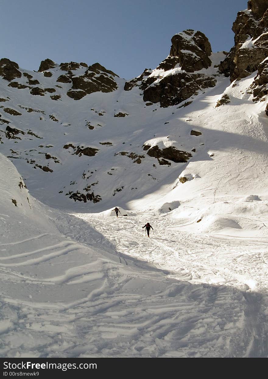 Skiers climb a mountain Italian. Skiers climb a mountain Italian