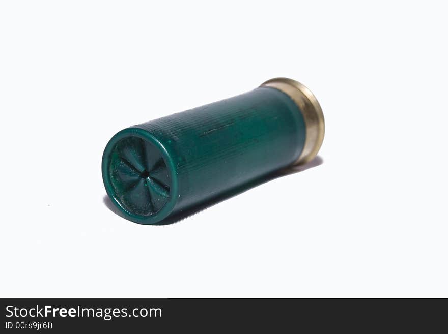 Single shotgun cartridge lying down viewed from the front