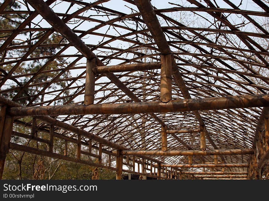 A wooden architecture with its top crossing and forming a net.
This picture is taken in Zhuozheng park in Suzhou ,China. A wooden architecture with its top crossing and forming a net.
This picture is taken in Zhuozheng park in Suzhou ,China