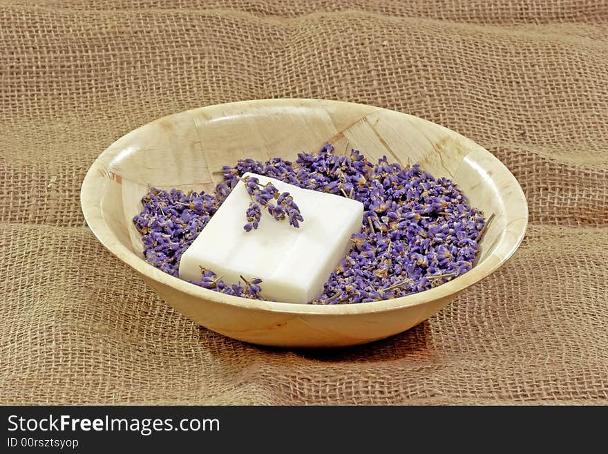 Perfume of lavender and soap on brown Background. Perfume of lavender and soap on brown Background