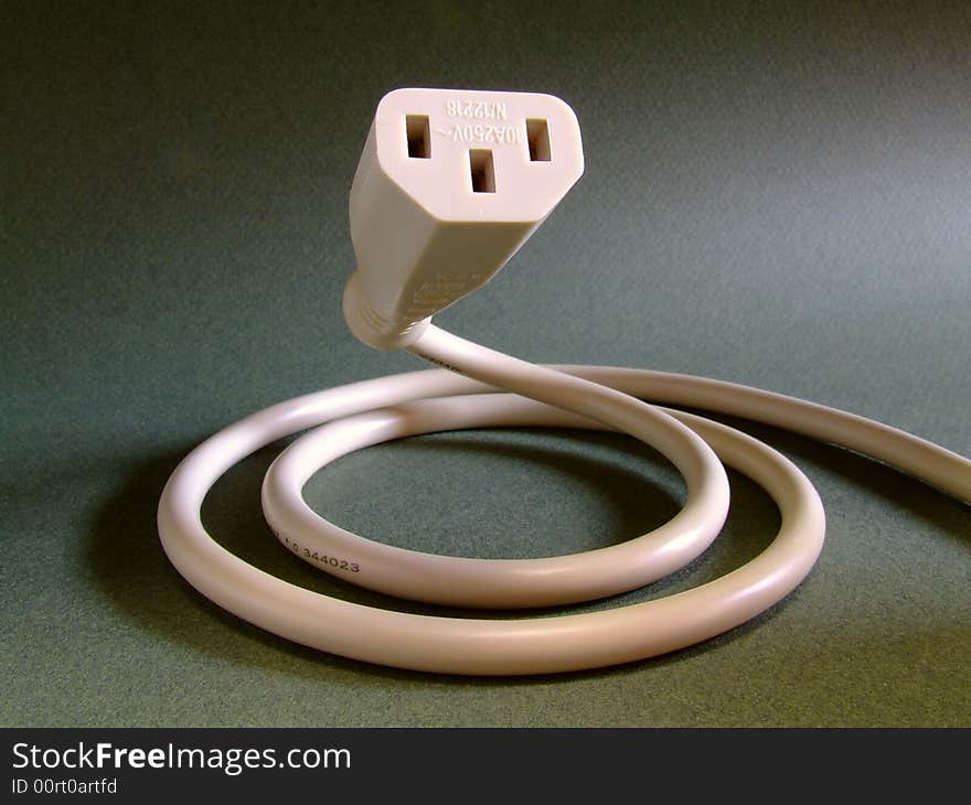 The power cable from a VDU - coiled to resemble a snake. The power cable from a VDU - coiled to resemble a snake.