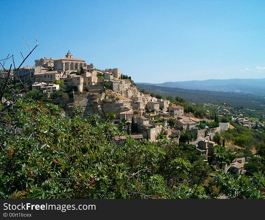 A picturesque Provencal village perched on a hill. A picturesque Provencal village perched on a hill