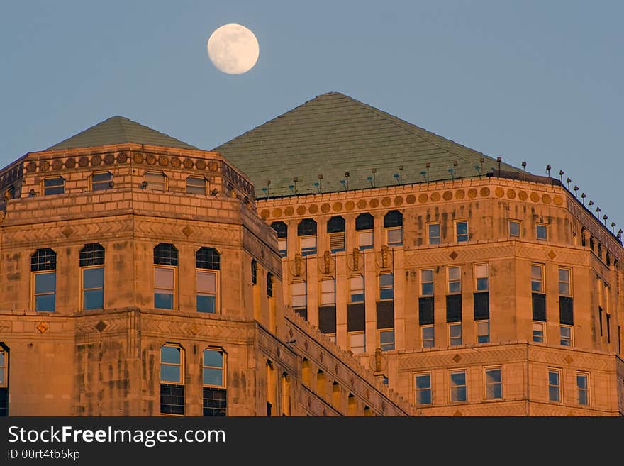 Moon over Merchandise Mart in Chicago