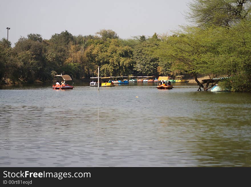 The lake at Old Fort is is a popular picnic spot at New Delhi. The Old Fort, also known as Purana Qila, is just behind the lake. The lake at Old Fort is is a popular picnic spot at New Delhi. The Old Fort, also known as Purana Qila, is just behind the lake.