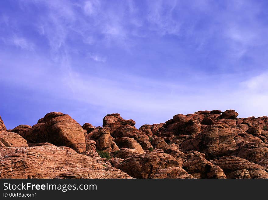 Red rock under blue sky