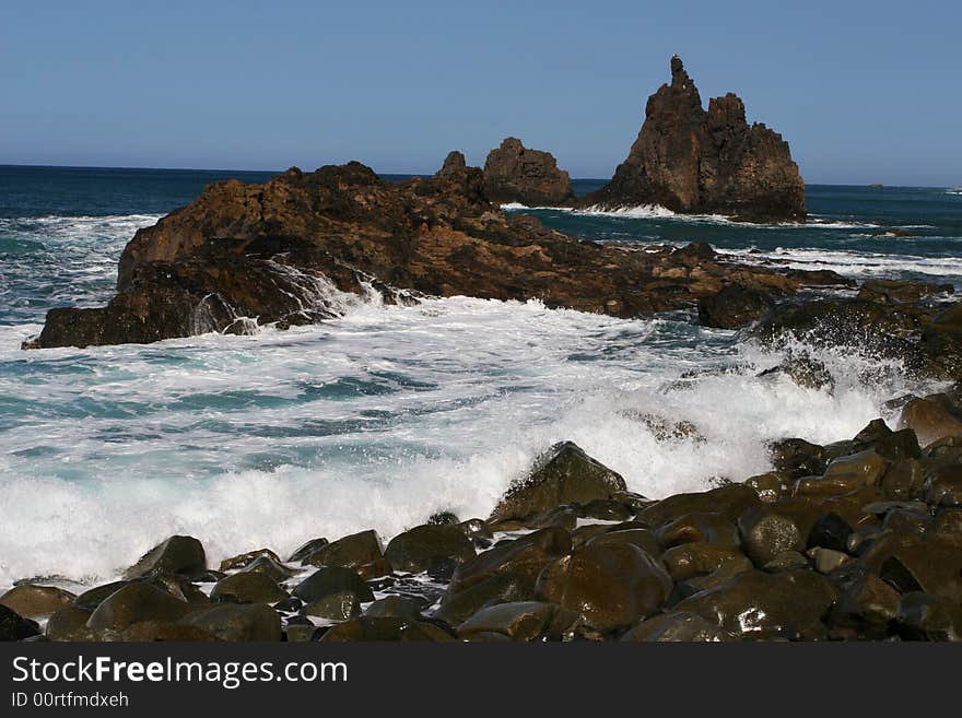 Dangerous rocky coast with waves