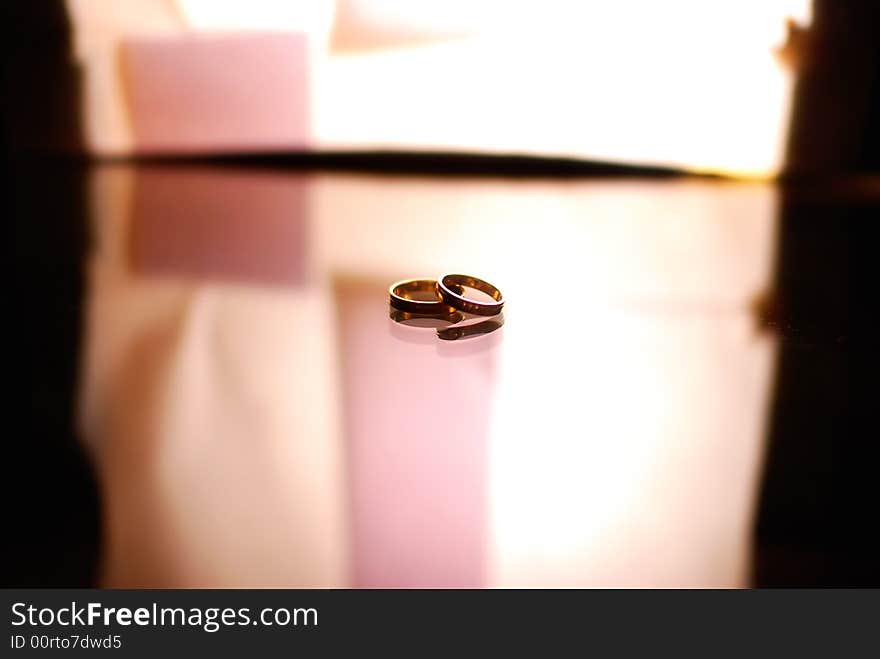 Rings on glass with lightbox behind