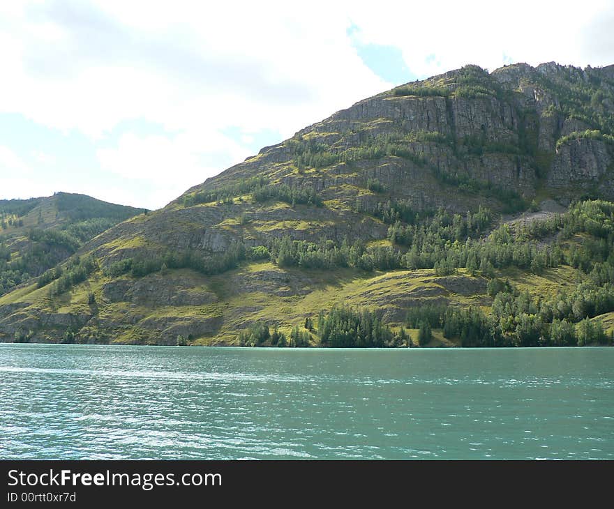 A mountain by Kanas Lake in China. A mountain by Kanas Lake in China