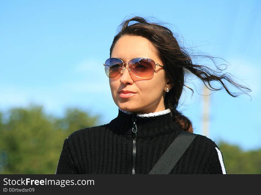 Girl in solar glasses