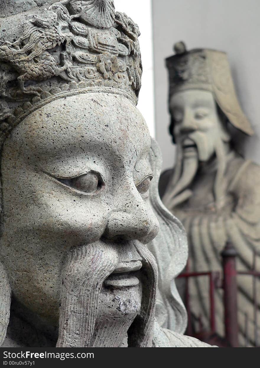 Asian Face Statue