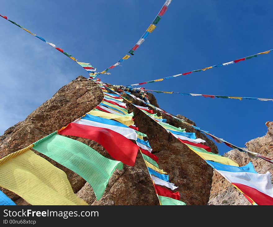 This photo was taken at the side of Namsto lake, Tibet, China. This lake is a holy site in Tibet Buddhism tales. Which is the world's highest lake at an altitude of about 4,700 metres (15,420 feet). The letions were written on the Tibet flag by Titetan for praying and blessing. This photo was taken at the side of Namsto lake, Tibet, China. This lake is a holy site in Tibet Buddhism tales. Which is the world's highest lake at an altitude of about 4,700 metres (15,420 feet). The letions were written on the Tibet flag by Titetan for praying and blessing.