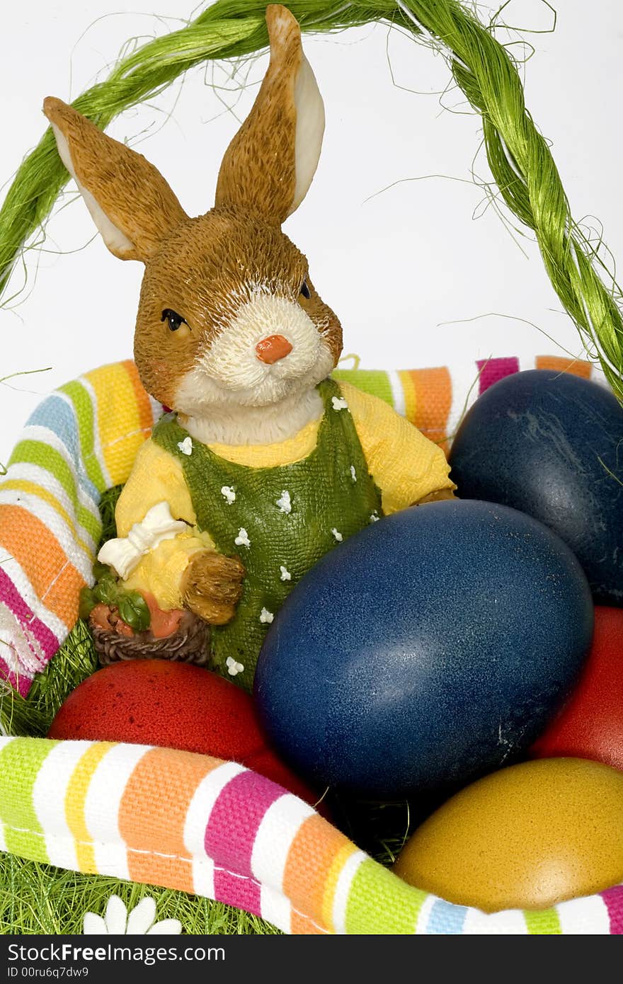 To Easter it is a custom to hide coloured Easter eggs and to give. Easter hare and Easter eggs as a symbol.