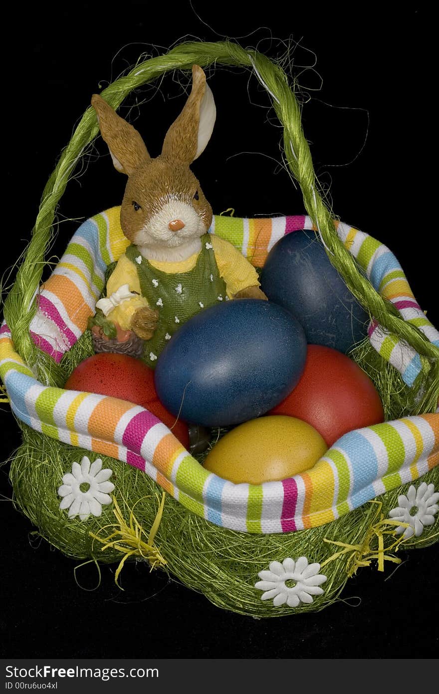 To Easter it is a custom to hide coloured Easter eggs and to give. Easter hare and Easter eggs as a symbol.