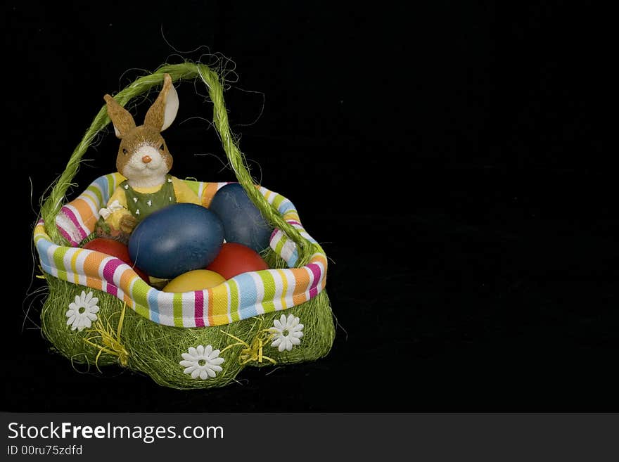 To Easter it is a custom to hide coloured Easter eggs and to give. Easter hare and Easter eggs as a symbol.