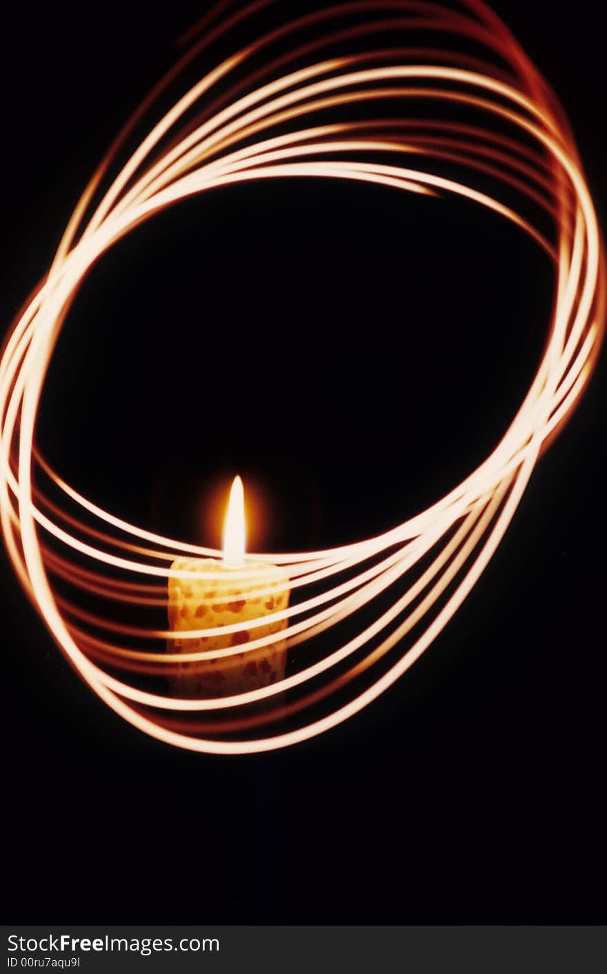 A long shutter produces this stream of candle light. A long shutter produces this stream of candle light