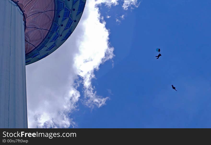 Malaysia Kuala Lumpur International Tower ; Blue sky and colorful parachute; Kuala Lumpur tower. Malaysia Kuala Lumpur International Tower ; Blue sky and colorful parachute; Kuala Lumpur tower