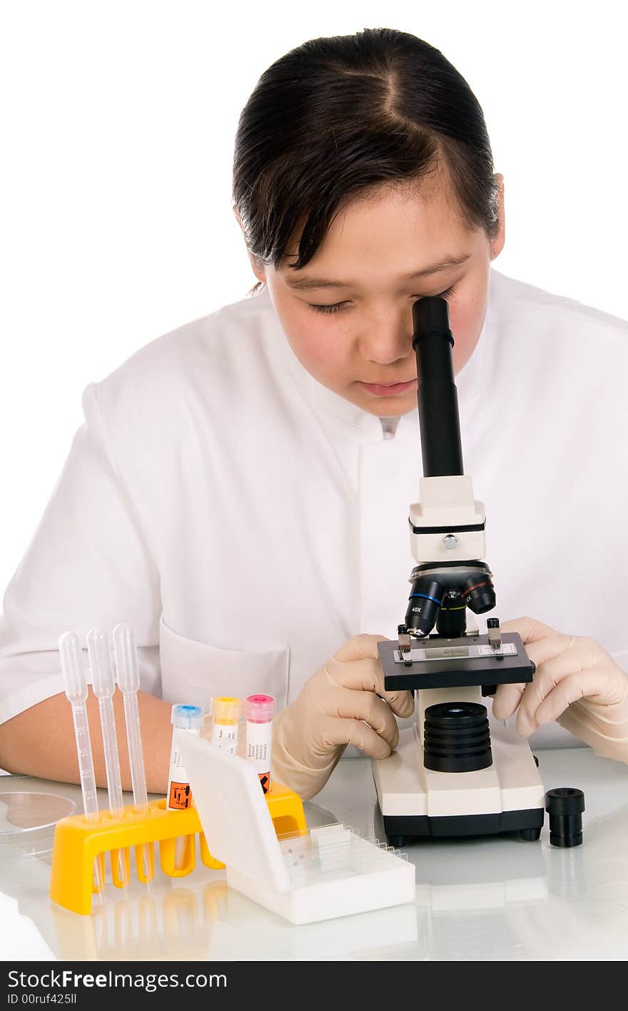 Girl with microscope, isolated on a white background. Girl with microscope, isolated on a white background.