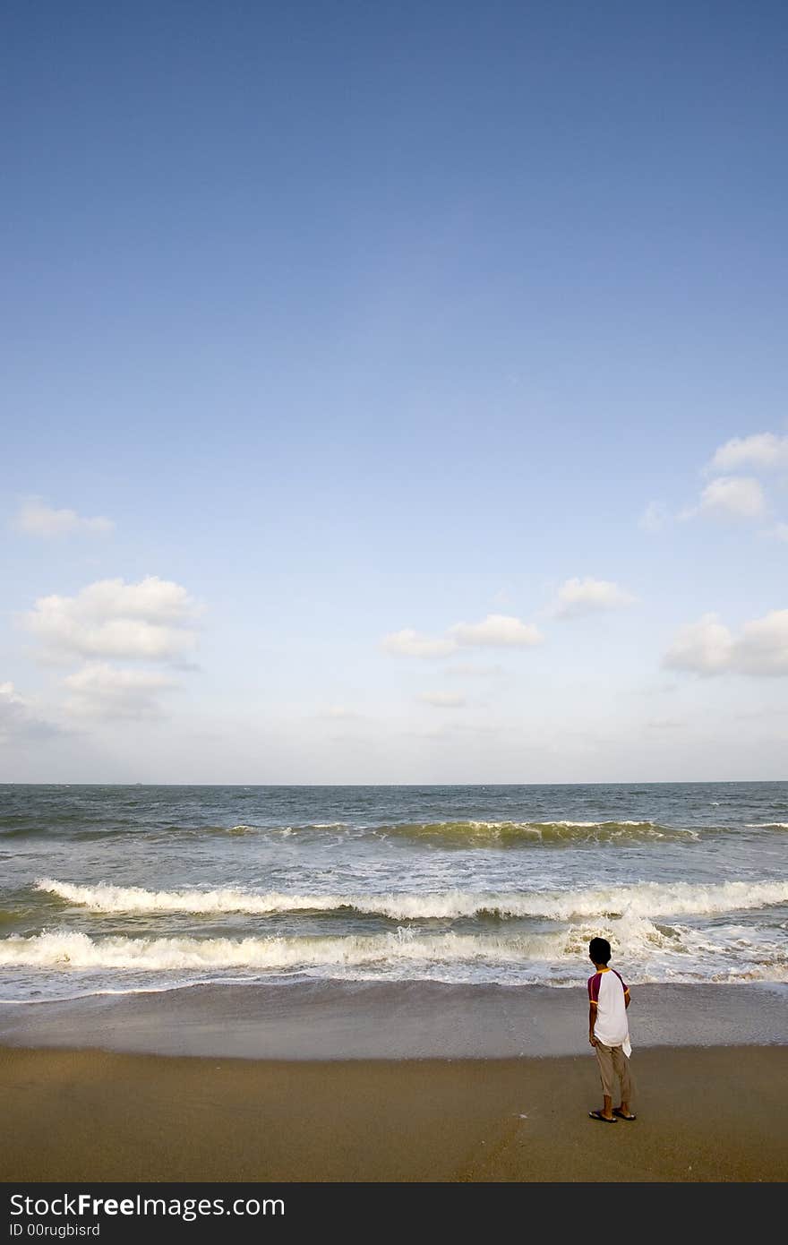 Child look out to the open ocean