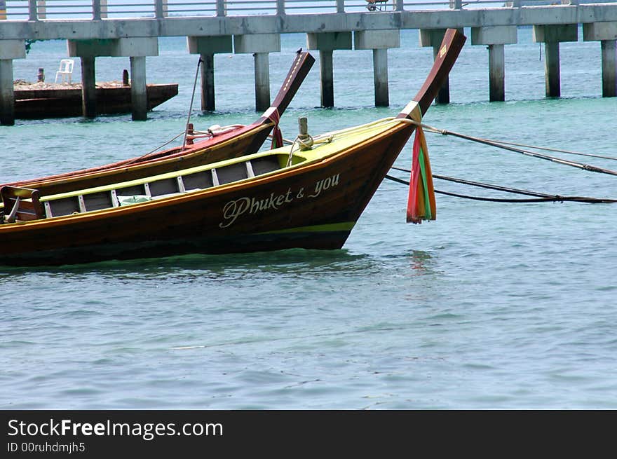 Thai boat with blessed ribbons in Puket, Thailand