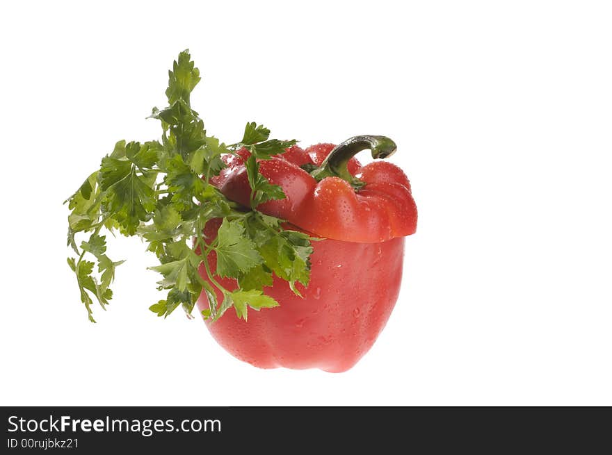 Pepper And Parsley Isolated Over White