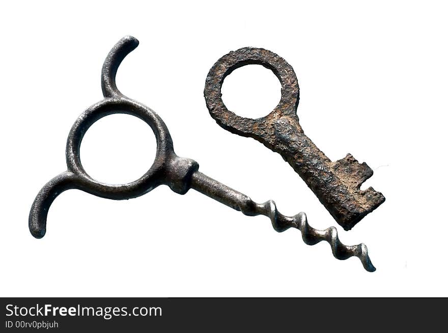 Corkscrew and rusty key