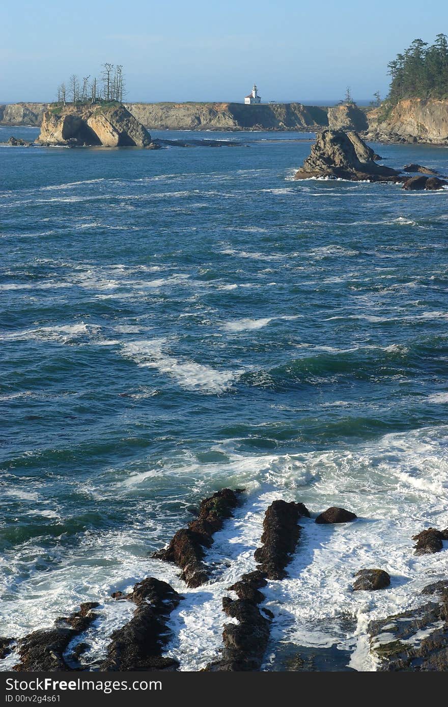 Coast of Sunset Bay State Park with Cape Arago Lighthouse. Coast of Sunset Bay State Park with Cape Arago Lighthouse