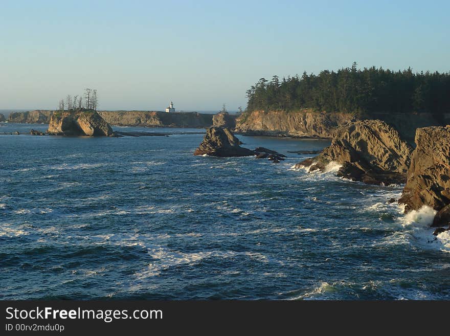 Coast of Sunset Bay State Park with Cape Arago Lighthouse. Coast of Sunset Bay State Park with Cape Arago Lighthouse