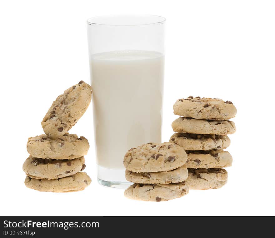 Delicious chocolate chip cookies and glass of milk isolated on a white background