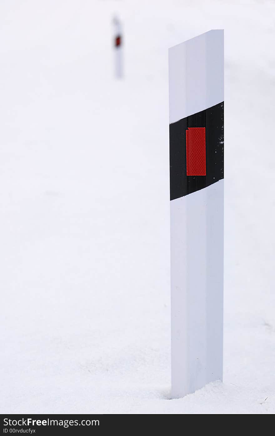 Post at winter road